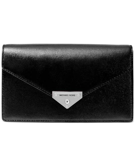 michael michael kors grace clutch|Michael Kors studded clutch.